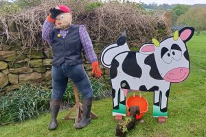 scarecrow_-_Farmer_and_his_cow